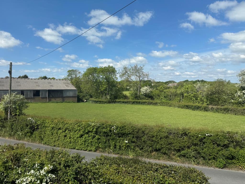 Lot: 102 - PAIR OF FREEHOLD COTTAGES IN A POPULAR VILLAGE LOCATION - A View From The Front Bedroom in Cottage One